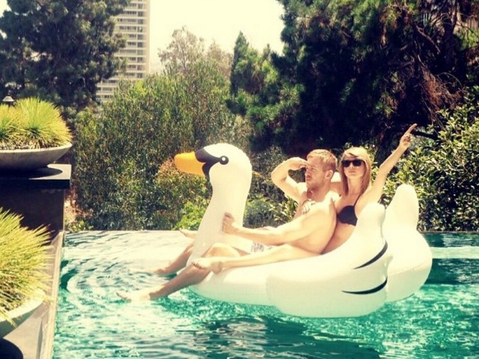 Celebrities on Giant Inflatable Swan Pool Floats